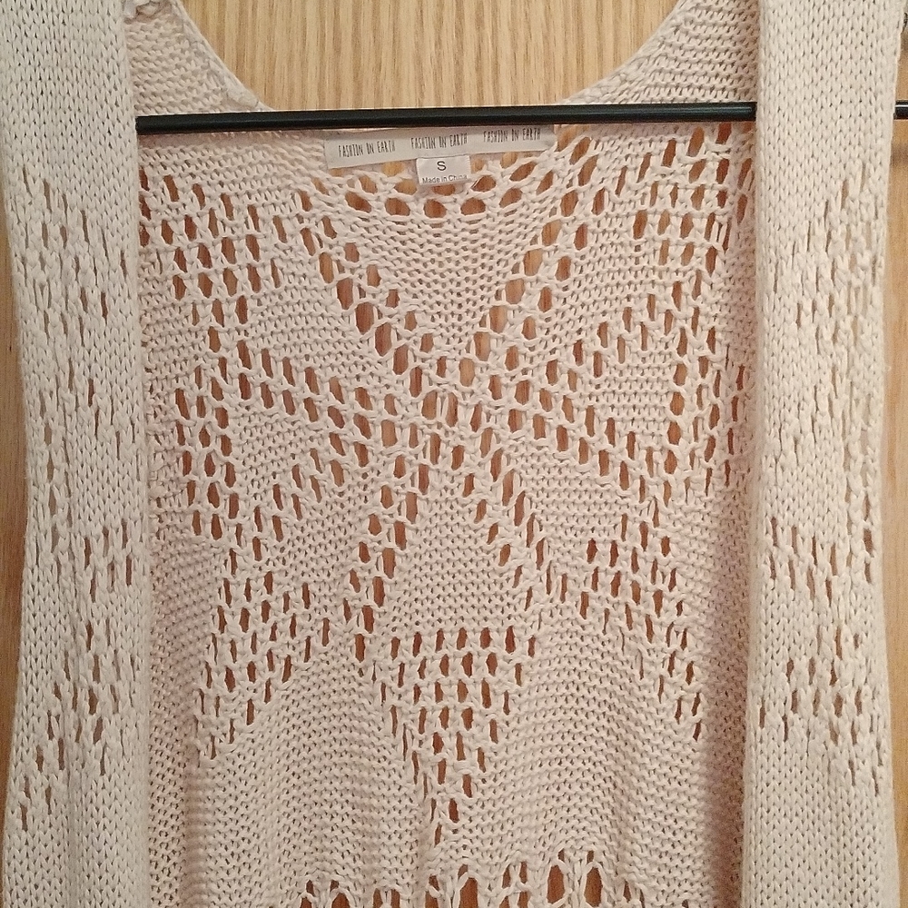 Long sleeveless natural woven shaw/wrap throw with fringe on bottom